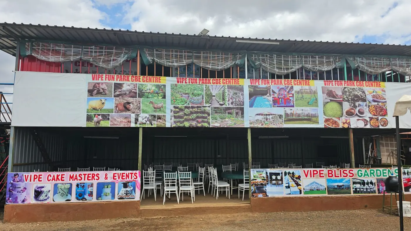 A wide view of the Vipe Fun Park CBE Centre building with its learning banners and open seating area