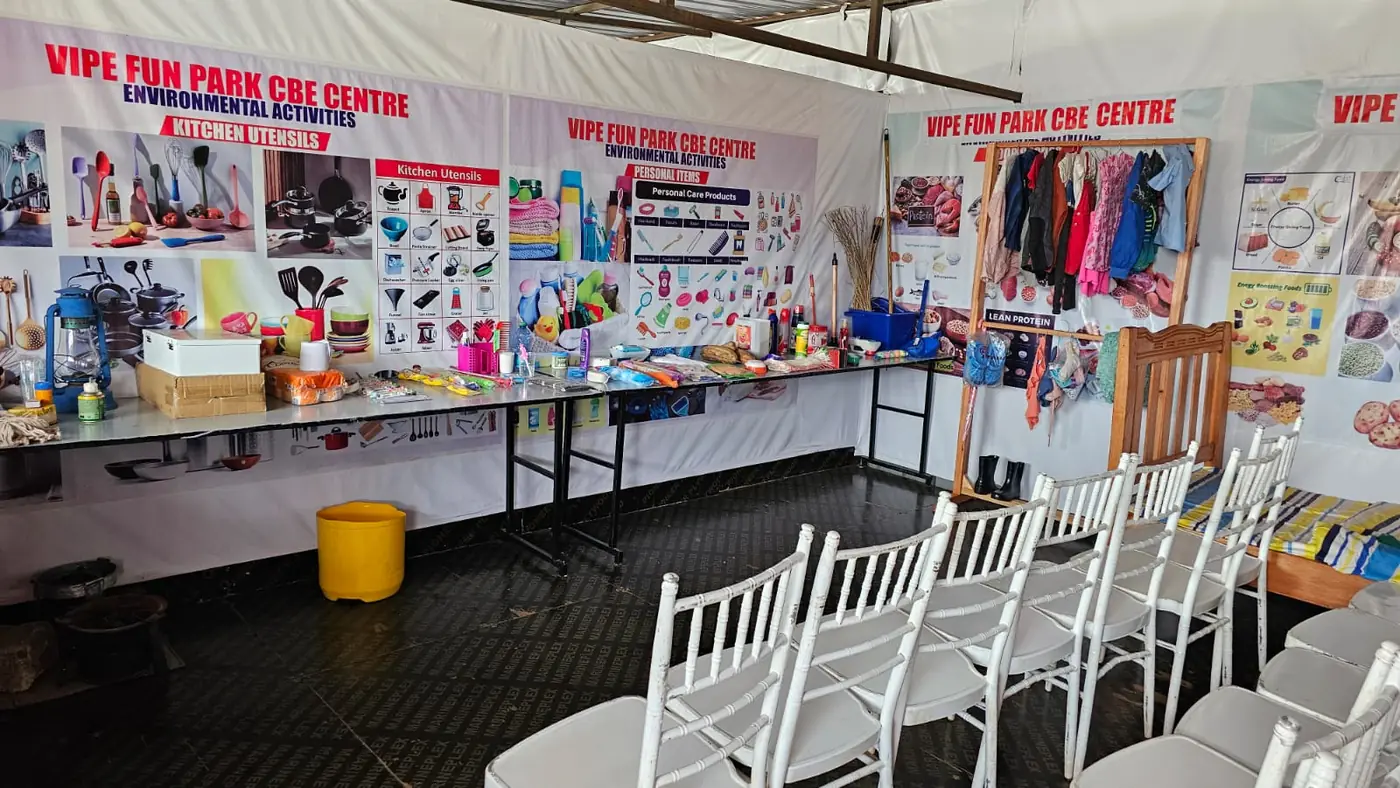The environmental activities room at the CBE Centre with kitchen utensils, personal care items and clothing displays