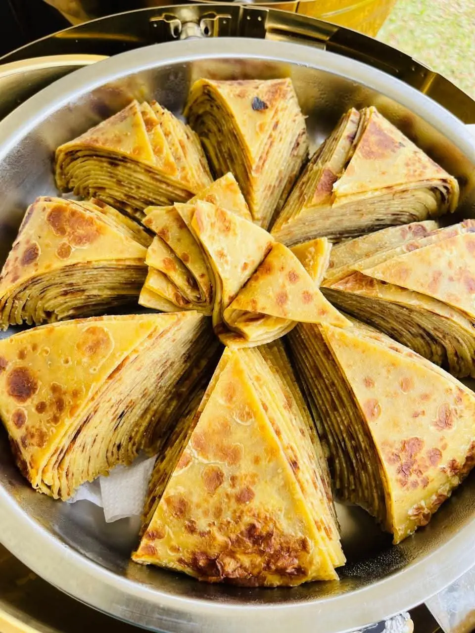 Freshly made chapati arranged in a serving dish at Vipe Fun Park