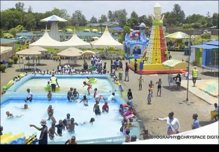 A busy day at the Vipe Fun Park pools with families swimming and playing