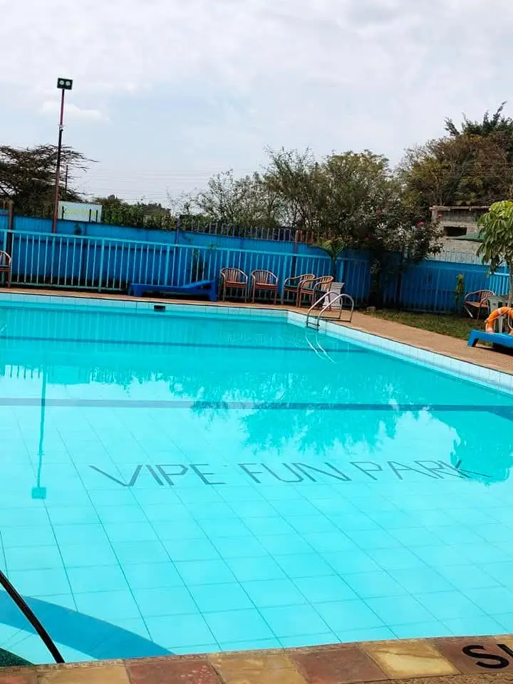 The main swimming pool at Vipe Fun Park with the park name tiled on the floor